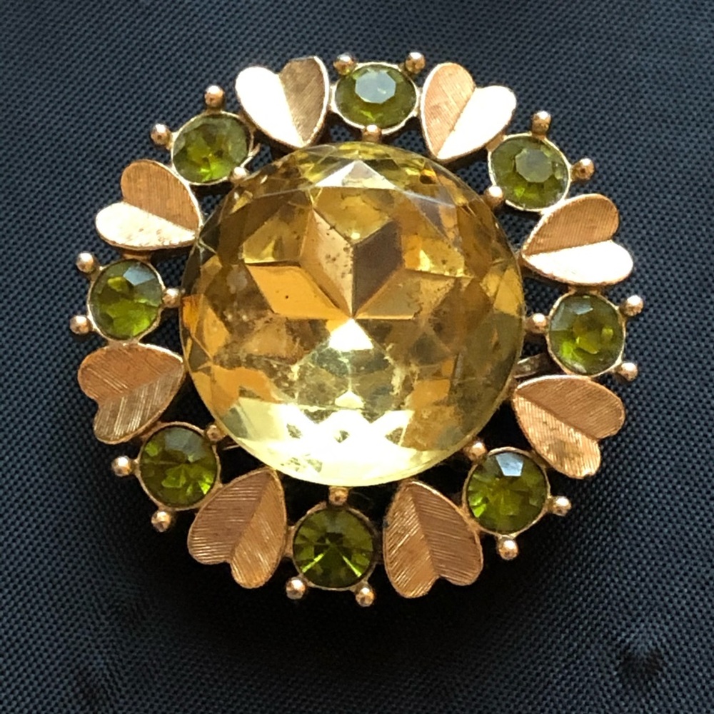 Brooch and earrings green stone gold tone detail
